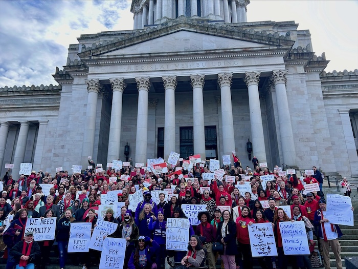 Advocates gather on the Capitol steps during the rally at Housing and Homelessness Advocacy Day in 2024.